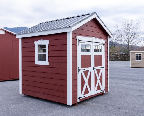 Wide photo of red garden house shed that Valley Structures gave away on social media