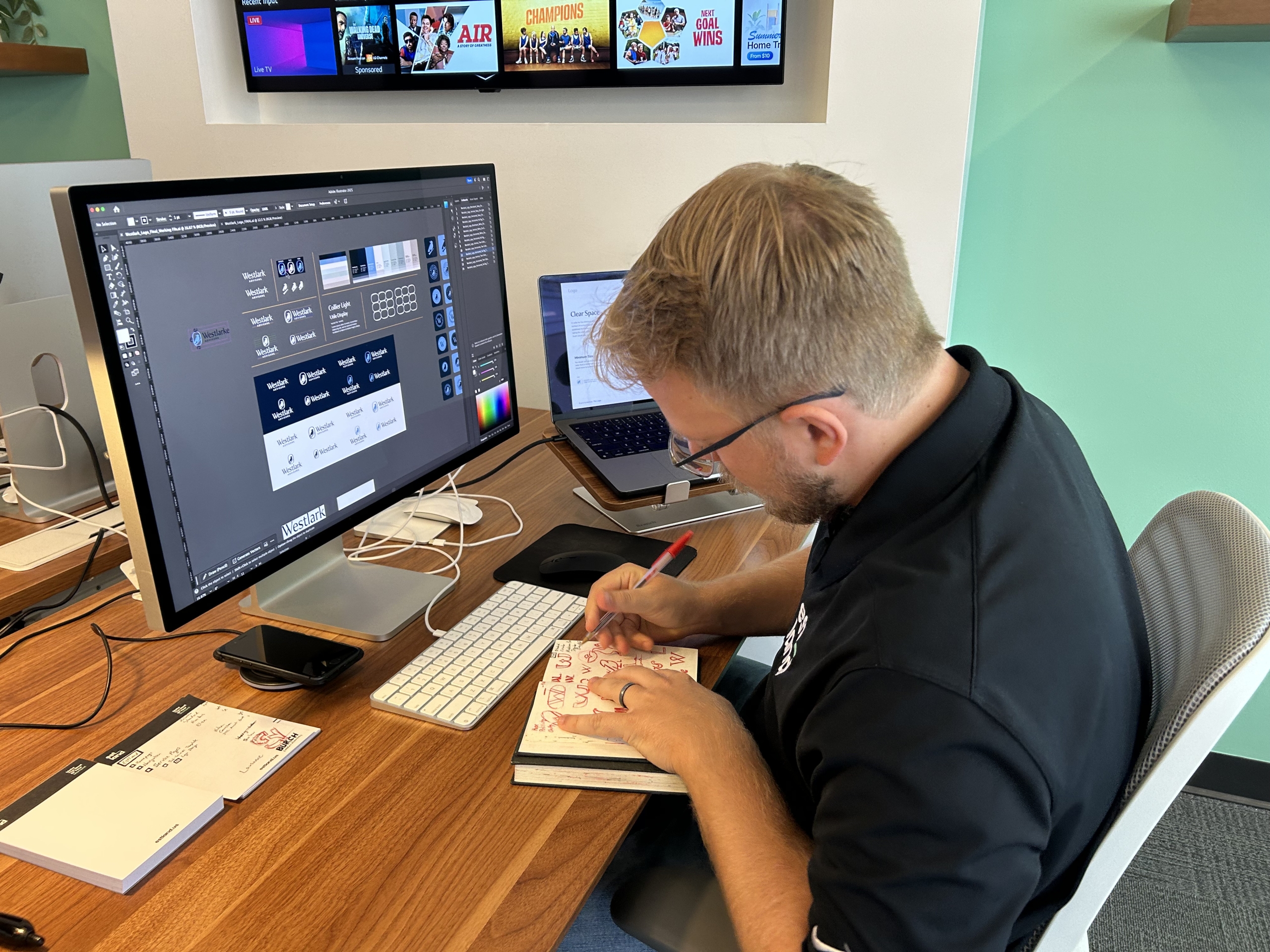 Austin Working on Logos For July 2025 Blog Piece